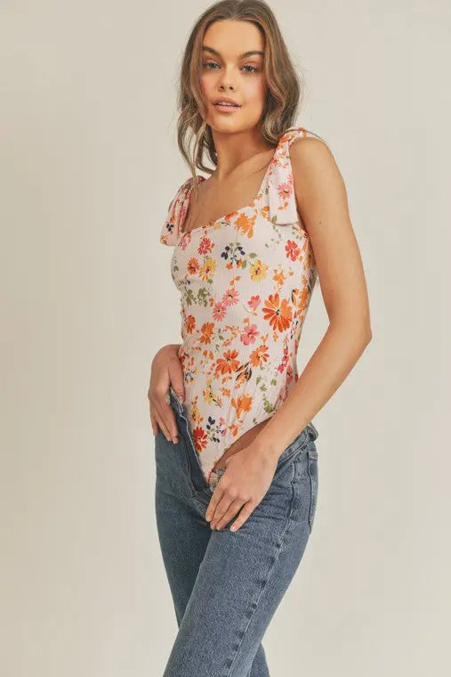 BLOOM YOUR OWN WAY WHITE FLORAL  PRINT BODYSUIT Uncommon Reign